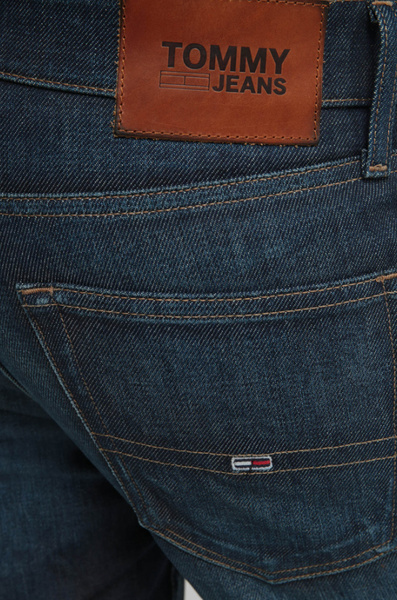 SPODNIE  TOMMY JEANS EFEKT ZNOSZENIA 33/34 DM0DM09298