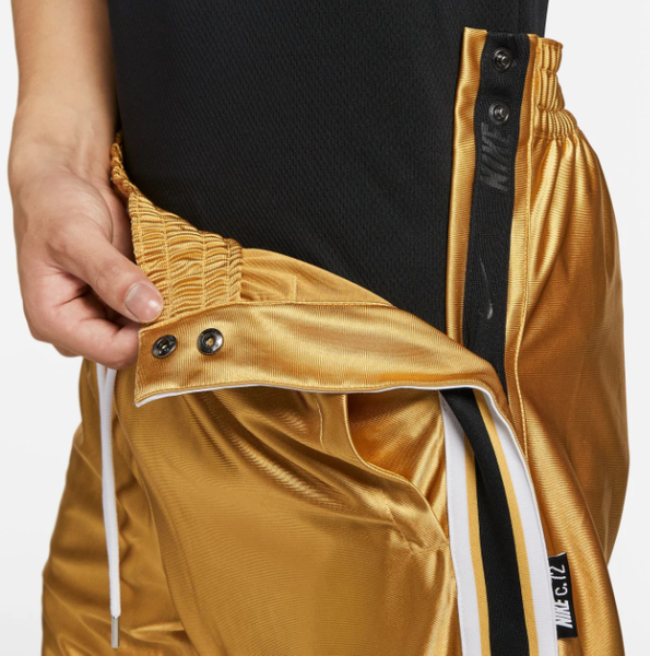 Złote Spodnie Dresowe Męskie Nike Tearaway DX0138725 M