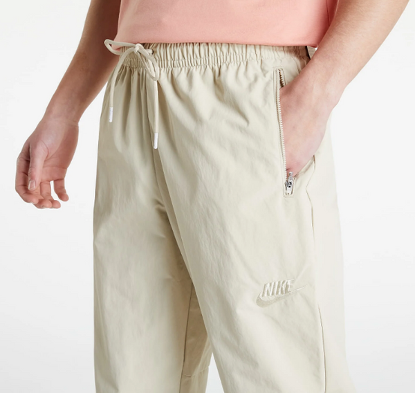 Beżowe Spodnie Dresowe Nike SW Revival DM5616-206 S