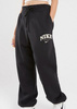 Nike Spodnie Dresowe Damskie - Czarne - Rozmiar M - NSW Phoenix Fleece - Oversize - FB9959-010