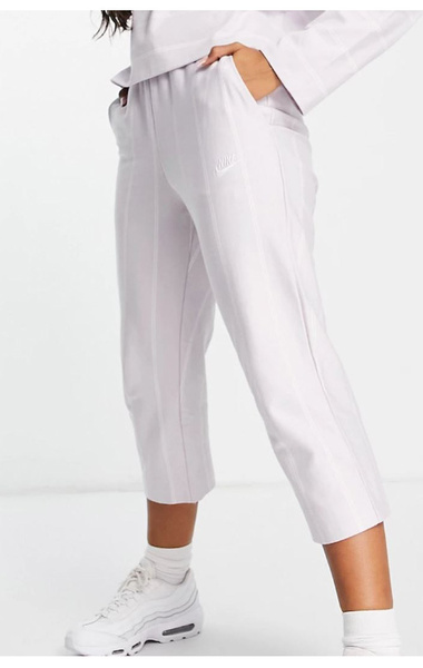 Beżowe spodnie Nike NSW DD5184-511 S 7/8 w Paski Swoosh