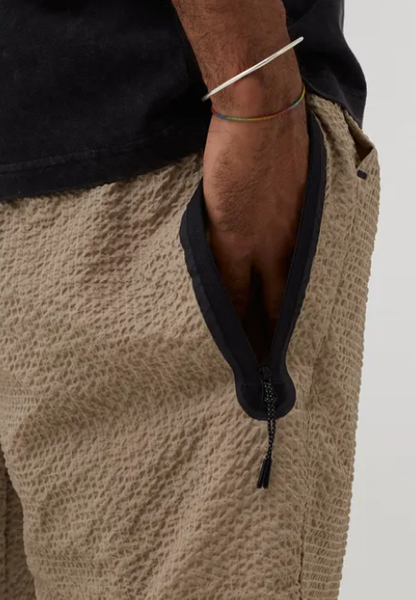 Beżowe Spodnie Joggersy Nike Sportswear Tech Essentials DQ4324-247 L